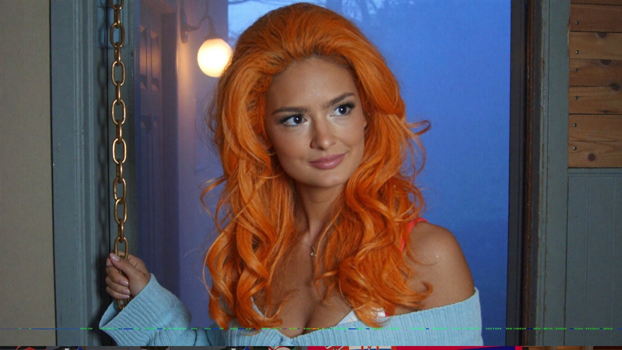 Orange-haired Carla peering through a chained door into the night.